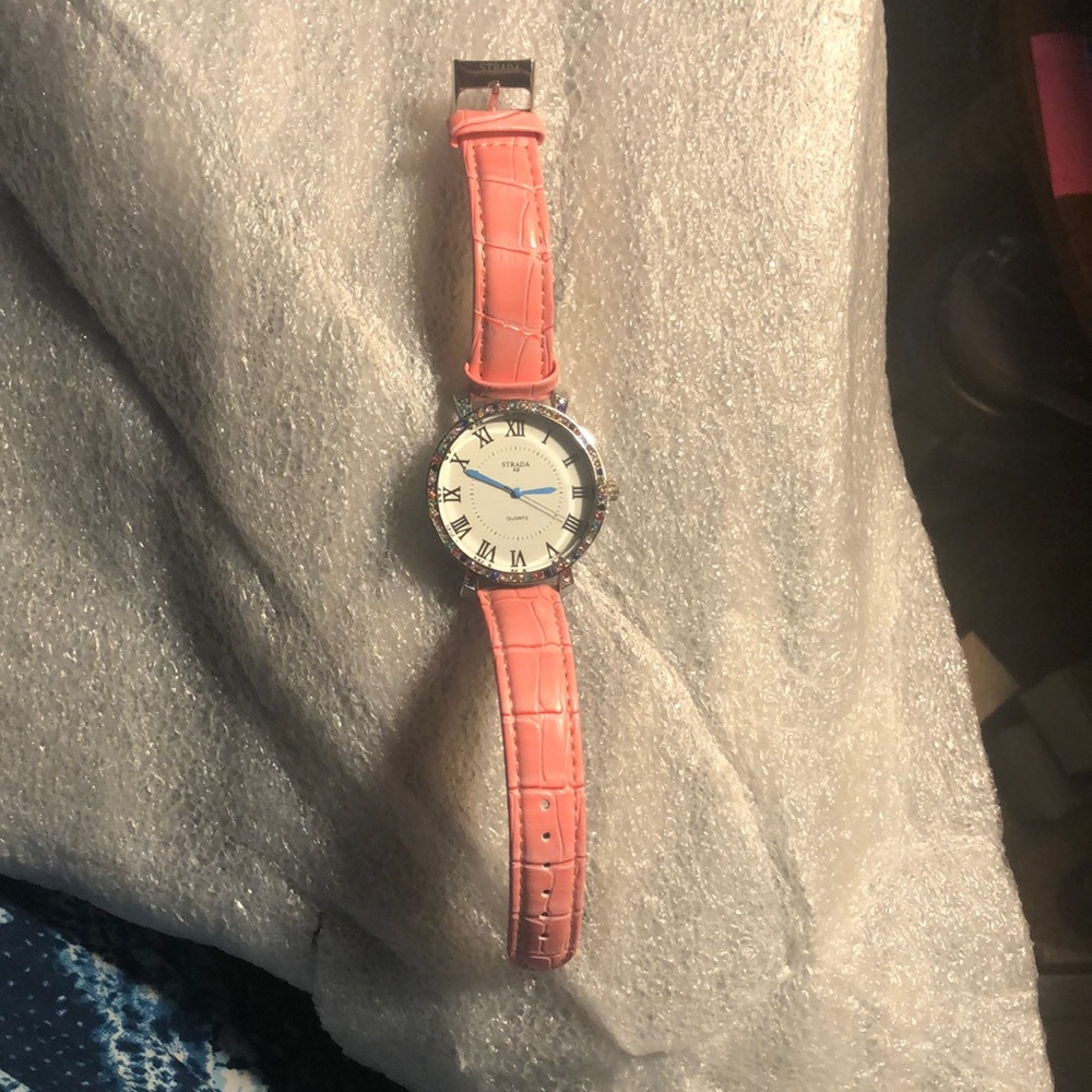 Strada quartz (battery operated) watch with pink faux leather wristband